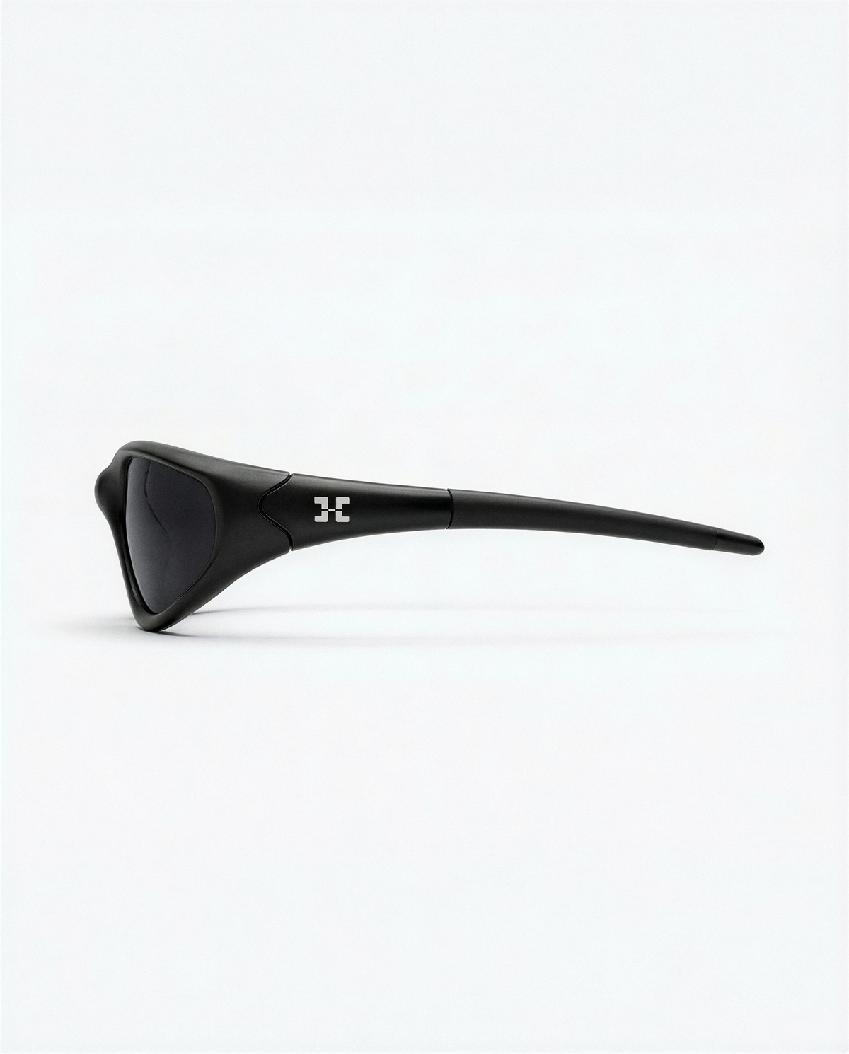 Black sunglasses with a brand logo on a white background