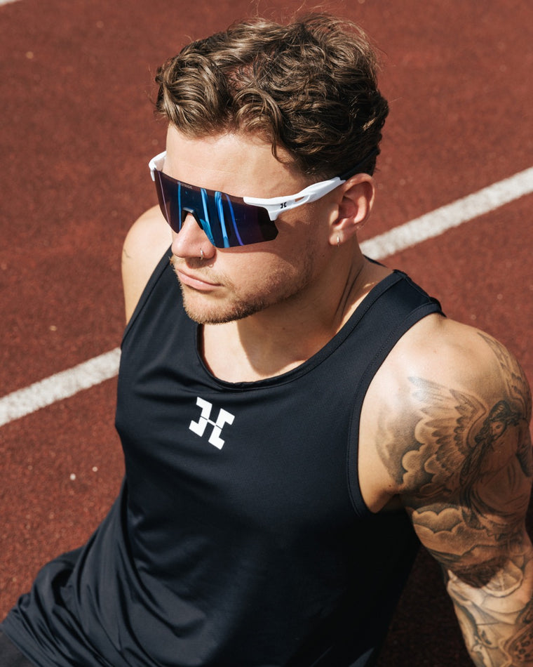 An athlete on the track in Hystride eyewear