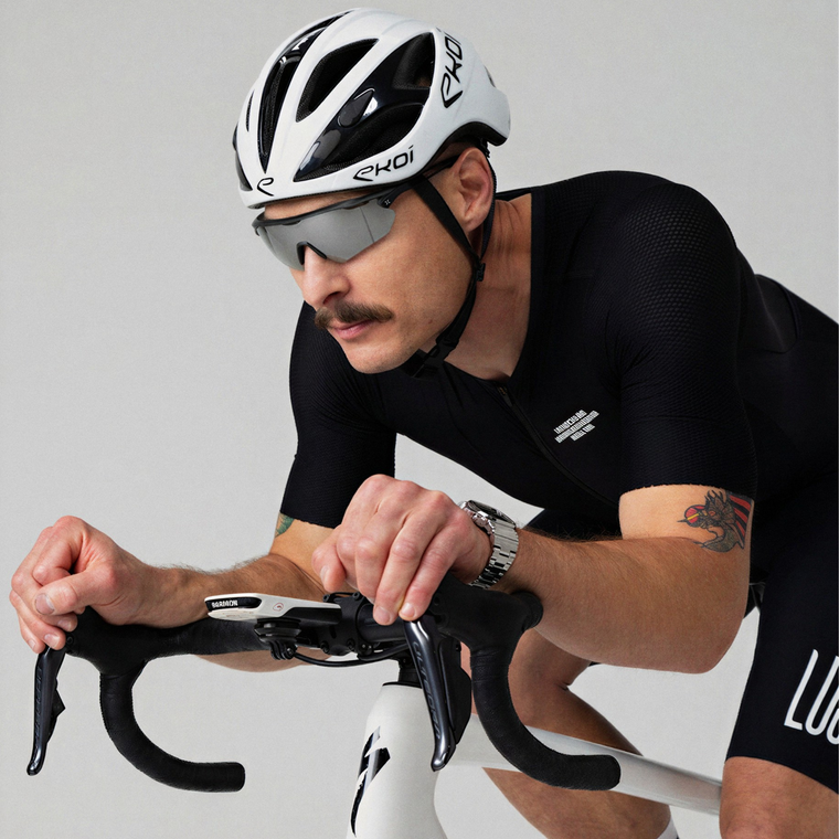 A road cyclist wearing Hystride eyewear