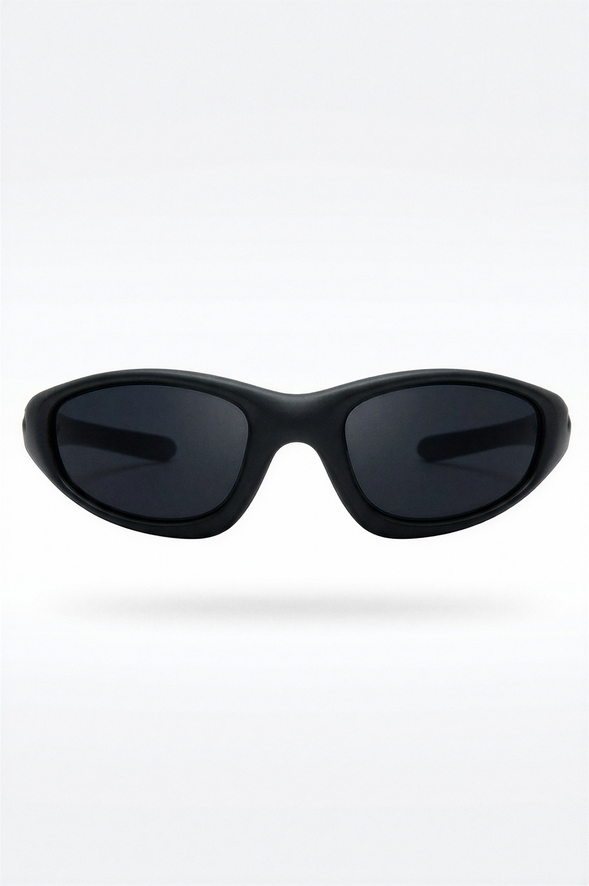 Gold-framed sunglasses with a reflective lens on a white background